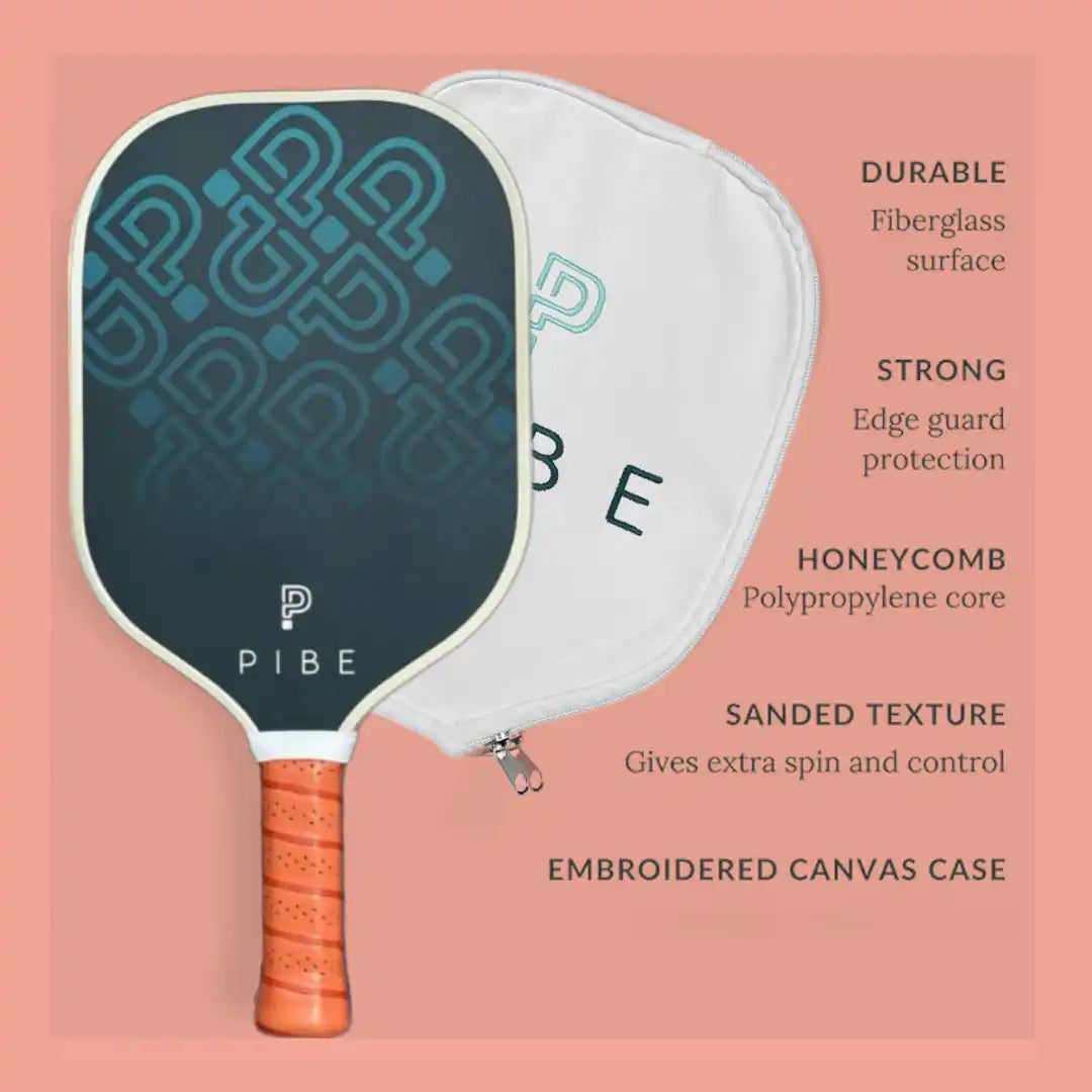 Pickleball paddle with teal patterned face and orange grip handle.